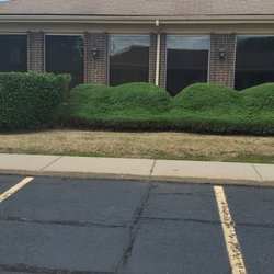 Liberty Lawn and Snow Services - Commercial customers property shrub and tree trimming