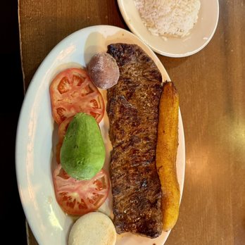 Mondongo's - Solomo steak, white rice, plantain, tomatoe, avocado, potato & arepa. - Empanadas Near Me - Doral, Florida Mondongo's - Solomo steak, white rice, plantain, tomatoe, avocado, potato & arepa. - Empanadas Near Me - Doral, Florida