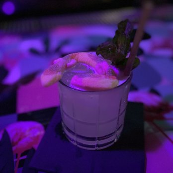 Tipsy Flamingo - River of grass ( delicious Smokey drink with a gummy snake ) second favorite drink ! - Cocktail Bars Near Me - Miami, Florida Tipsy Flamingo - River of grass ( delicious Smokey drink with a gummy snake ) second favorite drink ! - Cocktail Bars Near Me - Miami, Florida