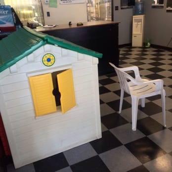 Accu Tint Window Tinting - Yes, that is a playhouse in the lobby - Car Window Tinting Near Me - Pembroke Pines, Florida