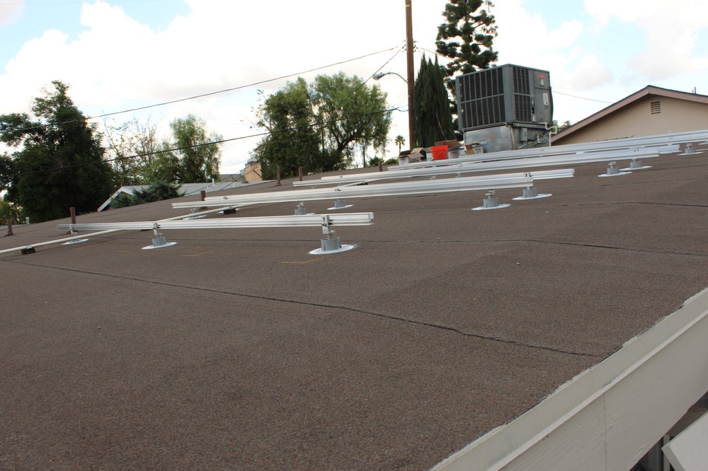 Slide of Helios Roofing & Solar