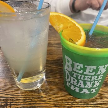 Crabby's Dockside - Our drinks. My bf had the rum punch in the souvenir cup. I had the mango sangria without the puree. - Seafood Near Me - Clearwater Beach, Florida