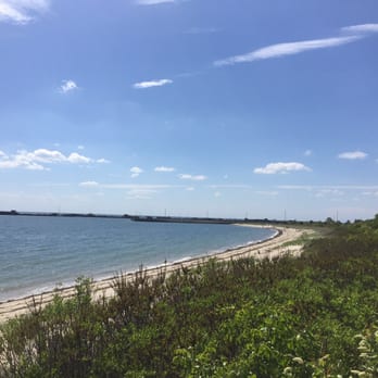 Kiptopeke State Park - The right side of the beach, viewing from the Peregrine Boardwalk. You'll see the fishing area and adjacent loading ramp for watercraft. - Beaches Near Me - Cape Charles, Virginia Kiptopeke State Park - The right side of the beach, viewing from the Peregrine Boardwalk. You'll see the fishing area and adjacent loading ramp for watercraft. - Beaches Near Me - Cape Charles, Virginia