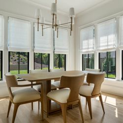 Acadia Shutters Shades & Blinds - Our customer transformed their breakfast room with our custom Roman shades, perfectly tailored for their beautiful Atlanta home.