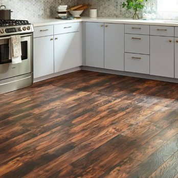Xcel Construction & Remodeling - a kitchen with wood floors - Roofing Near Me Xcel Construction & Remodeling - a kitchen with wood floors - Roofing Near Me