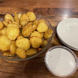 Henry's Restaurant - Fried Pickles appetizer - with ranch dipping sauce - $6.99 - super piping hot out of the fryer - so good and large shareable portion size!