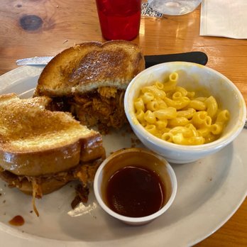 Bubba's Breakfast & BBQ - 1/2 Pulled chicken sandwich & 1/2 Bubbas sloppy sandwich with Mac & cheese   Damn good!! So glad my buddy shared half his sandwich with me!! - Barbeque Near Me - Jackson, Wyoming