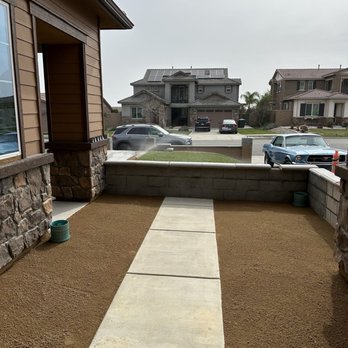 Vallejo Property Preservation - Enclosed patio, leveled the ground, added drainage and DG, stuccoed the wall. - Landscaping Near Me - Riverside, California