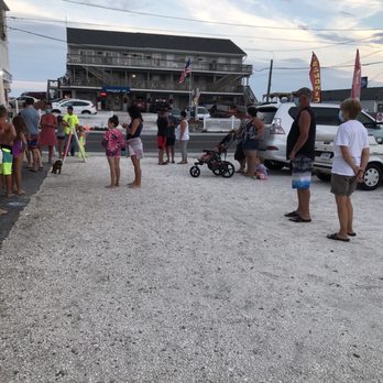 Beach Bums Cafe & Creamery - a group of people standing in a parking lot - Ice Cream & Frozen Yogurt Near Me - Westerly, Rhode Island