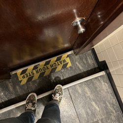 Ore Nells North - Brutal steps up into the bathroom, be careful. This is standing on the top step inside the bathroom.