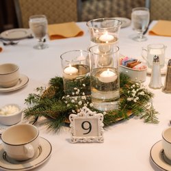 Amy's Flower Junction - They were able to put together the centerpieces on site the morning of the wedding.
