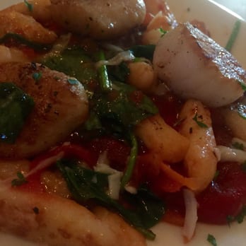 Sheehan's Irish Pub - Scallop appetizer comes with three on a bed of gnocchi. - Irish Pub Near Me - Augusta, Georgia Sheehan's Irish Pub - Scallop appetizer comes with three on a bed of gnocchi. - Irish Pub Near Me - Augusta, Georgia