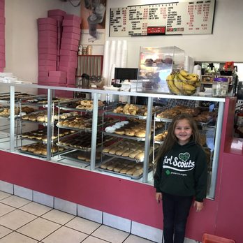 K & M Doughnut - a little girl standing in front of the counter - Donuts Near Me - Alta Loma, California K & M Doughnut - a little girl standing in front of the counter - Donuts Near Me - Alta Loma, California
