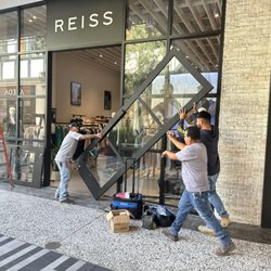 Prime Locksmith - Commercial glass doors removal and reinstalled after high security locks replacement.