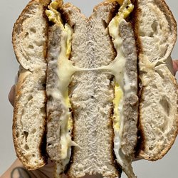 Deli of Course - Sausage egg and cheese on a plain bagel