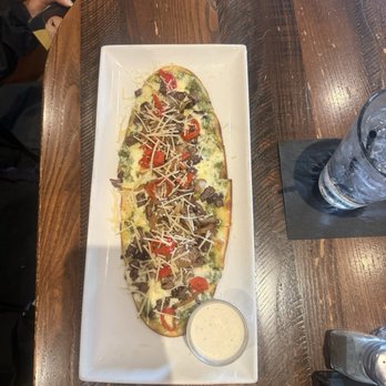 Social House Arlington - Chicken Pesto Flatbread (replaced chicken with steak) and side of fries - Bars Near Me - Arlington, Texas Social House Arlington - Chicken Pesto Flatbread (replaced chicken with steak) and side of fries - Bars Near Me - Arlington, Texas