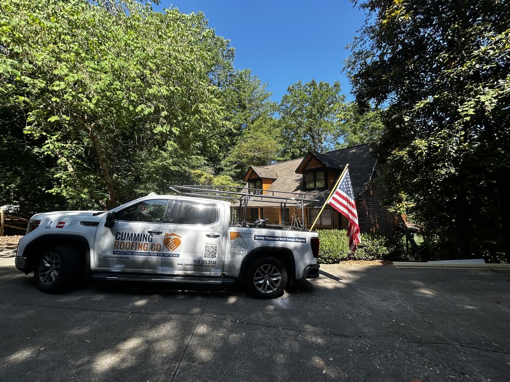 Slide of Cumming Roofing Company