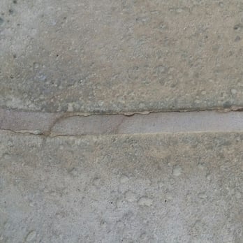 Kenny Miller Tile and Masonry - a closeup of the edge of a pool - General Contractors Near Me - Riverside, California