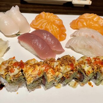Genki Restaurant & Sushi Bar - Christmas roll, salmon nigiri, tuna nigiri, scallop nigiri, pink snapper nigiri- all so delicious - Japanese Near Me - Cary, North Carolina Genki Restaurant & Sushi Bar - Christmas roll, salmon nigiri, tuna nigiri, scallop nigiri, pink snapper nigiri- all so delicious - Japanese Near Me - Cary, North Carolina