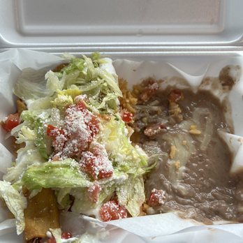 The Taqueria - Rolled taco combo with rice and beans - Mexican Near Me - Oshkosh, Wisconsin The Taqueria - Rolled taco combo with rice and beans - Mexican Near Me - Oshkosh, Wisconsin