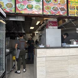 Yum - Busy Yum staff taking orders and cookin' up a storm on an early Sunday evening