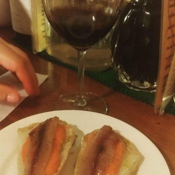 La Tana - Sardines over tomato puree on bread. - Tapas Bars Near Me - Granada, GR