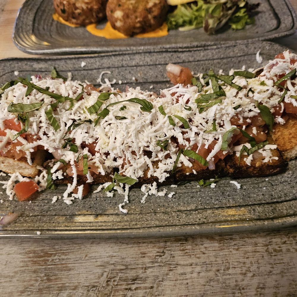 Edgewater Restaurant - Bruschetta topped with shaved goat cheese - Seafood Near Me - Hampton Bays, New York