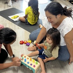 SLP in Harmony - Instructor with mom and toddler