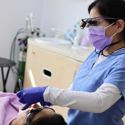 Bridgepointe Dental Studio - Dr. Edda Sidorova providing gentle, personalized dental care to a patient at Bridgepointe Dental Studio in Metuchen, NJ.
Copy caption