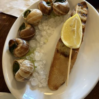 Thames Street Oyster House - Escargot With Matre D'htel Butter - Seafood Near Me - Baltimore, Maryland Thames Street Oyster House - Escargot With Matre D'htel Butter - Seafood Near Me - Baltimore, Maryland