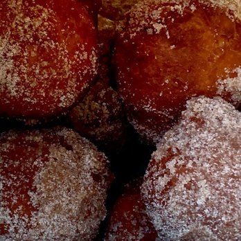 VIP Treats and Sweets - MALASADAS gently shaken in a bag with cinnamon sugar - Bakeries Near Me - Kapaa, Hawaii