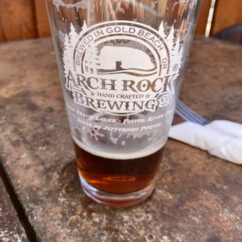 Barnacle Bistro - a pint of beer on a table - American Near Me - Gold Beach, Oregon Barnacle Bistro - a pint of beer on a table - American Near Me - Gold Beach, Oregon