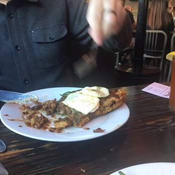 Bosscat Kitchen & Libations - Chicken fried steak with eggs on the top. - New American Near Me - Irvine, California