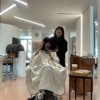 Theodora Hair Studio Olympic - Emma getting these bangs right - Hair Salons Near Me - Los Angeles, California Theodora Hair Studio Olympic - Emma getting these bangs right - Hair Salons Near Me - Los Angeles, California