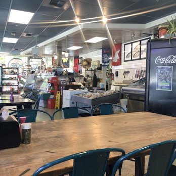 Seattle Fish Guys - Inside -there's a small seating area - Seafood Markets Near Me - Seattle, Washington