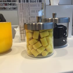 By front desk - free hair ties and ear plugs!!