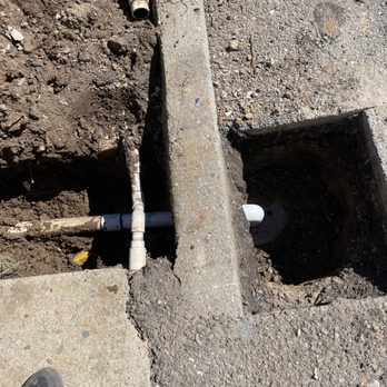 Empire Leak Detection - Repaired section of 2" pipe between asphalt and planter. - Plumbing Near Me - Orangevale, California Empire Leak Detection - Repaired section of 2" pipe between asphalt and planter. - Plumbing Near Me - Orangevale, California