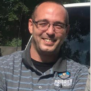 Priority AC & Heat - Senior Tech exercising his smiling muscles. - Heating & Air Conditioning/HVAC Near Me - Houston, Texas Priority AC & Heat - Senior Tech exercising his smiling muscles. - Heating & Air Conditioning/HVAC Near Me - Houston, Texas