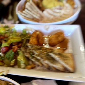 Jerusalem Garden Cafe - Kabees w/zaatar Pita, pickles and olives - Middle Eastern Near Me - Asheville, North Carolina Jerusalem Garden Cafe - Kabees w/zaatar Pita, pickles and olives - Middle Eastern Near Me - Asheville, North Carolina