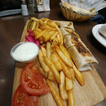 Paramount Fine Foods - Chicken Saj wrap with side fries and garlic sauce - Middle Eastern Near Me - Edmonton, Alberta