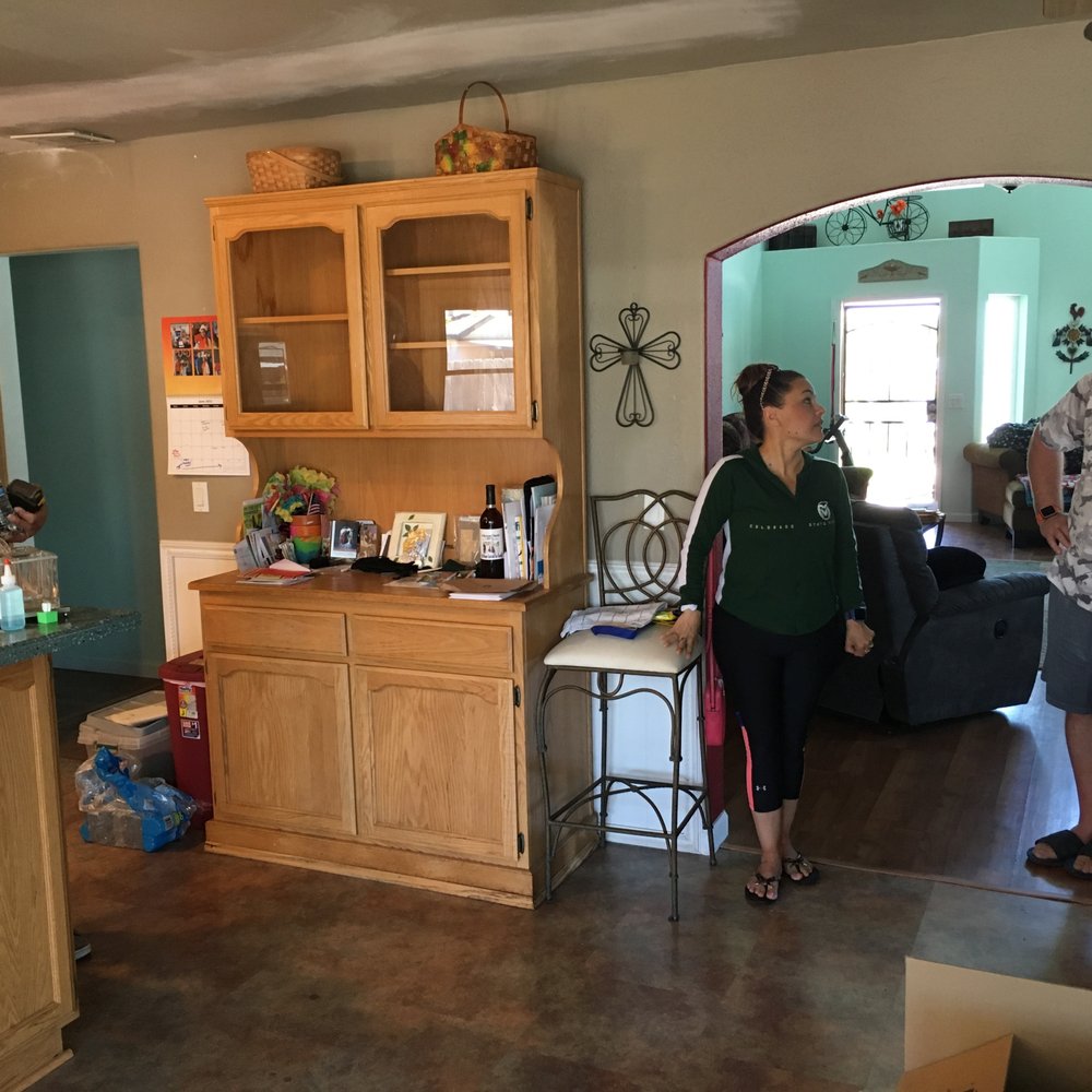 Cornerstone Remodeling - View from dining room to living room before taking out most of that wall - General Contractors Near Me