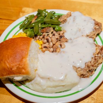 Butter Churn - a plate of food on a wooden table - Buffets Near Me - Aransas Pass, Texas Butter Churn - a plate of food on a wooden table - Buffets Near Me - Aransas Pass, Texas