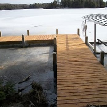Northland Docks - a dock on a frozen lake - General Contractors Near Me - Arbor Vitae, Wisconsin Northland Docks - a dock on a frozen lake - General Contractors Near Me - Arbor Vitae, Wisconsin
