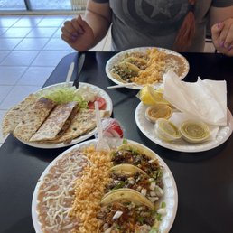 3 tacos with rice and beans plate and a carne asada quesadilla 3 tacos with rice and beans plate and a carne asada quesadilla
