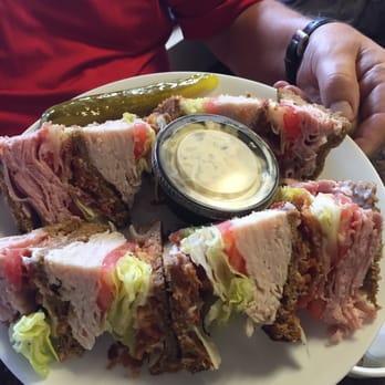 Goldies Restaurant - Turkey and ham club. Huge- but surprising light due to the thin cuts of meat. - Breakfast & Brunch Near Me - Naples, Florida Goldies Restaurant - Turkey and ham club. Huge- but surprising light due to the thin cuts of meat. - Breakfast & Brunch Near Me - Naples, Florida