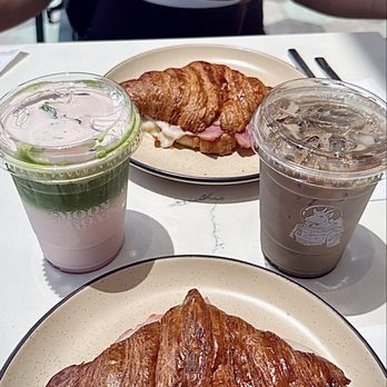 Moongoat Greenhouse - Strawberry watermelon matcha w/ cold foam and Ham & cheese croissant - Coffee Roasteries Near Me - Costa Mesa, California Moongoat Greenhouse - Strawberry watermelon matcha w/ cold foam and Ham & cheese croissant - Coffee Roasteries Near Me - Costa Mesa, California
