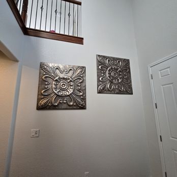 Ayala Painting - Entry way wall next yo the doorfownsta8rs entry hall - Painters Near Me