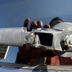 Broken rear wiper arm.