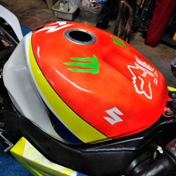 Custom painted Suzuki motorcycle tank