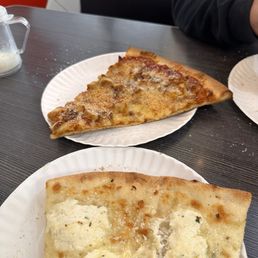 White pizza and Chicken Parmesan Slices